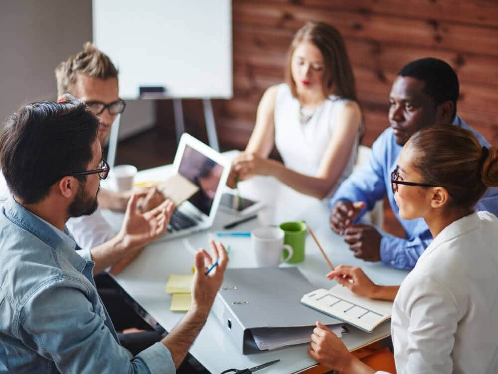 An official meeting where employees are having work-related discussion